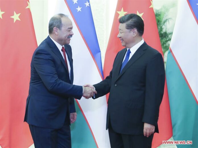 Chinese President Xi Jinping meets with visiting Uzbek Prime Minister Abdulla Aripov at the Great Hall of the People in Beijing, capital of China, Aug. 28, 2019. (Xinhua/Yao Dawei)
