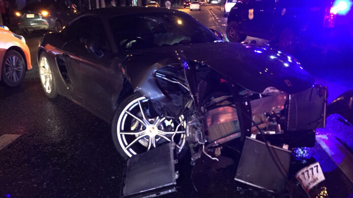 Wrecked Porsche at the scene on Ratchadapisek Road on August 8. Wrecked Porsche at the scene on Ratchadapisek Road on August 8.