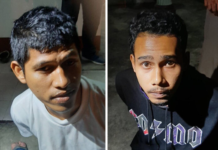 Wildun Maha, left, and Luai Sae-ngae, right, under police custody on Aug. 1, 2019.