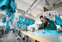 Bikinis, Guitars, Glasses: How China’s Small Towns Meet Global Demand A worker makes bikini at a workshop of a sportswear company in Huludao City, northeast China's Liaoning Province, March 6, 2019. Photo: Pan Yulong / Xinhua