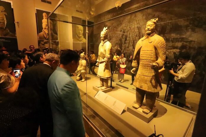 Visitors view Terracotta Warriors at a temporary exhibition in Bangkok on Sep. 15, 2019.