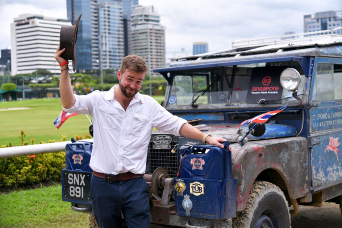Alex Bescoby next to the Oxford on Sept. 2, 2019 at the Royal Bangkok Sports Club. Alex Bescoby next to the Oxford on Sept. 2, 2019 at the Royal Bangkok Sports Club.