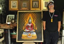 Group Drops ‘Ultraman Buddha’ Charges, But Sees Larger Conspiracy An auction organizer poses next to an "Ultraman Buddha" painting which sold for 2 million baht on Sep. 13, 2019. Image: ปกรณ์ พรชีวางกูร / Facebook