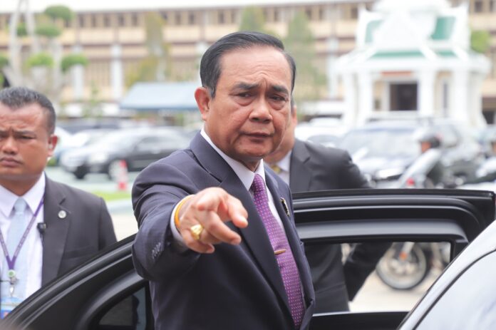 PM Prayuth Chan-ocha gestures at reporters on Sep. 5, 2019, at the Ministry of Defense.