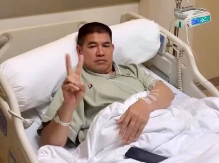 Thammanat Prompao lies in a hospital bed Sept. 17, 2019 at Bangkok Hospital.