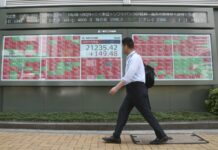 Asian Shares Rise on Optimism Over More Us-China Trade Talks A man walks by an electronic stock board of a securities firm in Tokyo, Friday, Sept. 6, 2019. Asian shares rose Friday as investors cheered plans for more trade negotiations between Washington and Beijing and drew encouragement from positive data about the U.S. economy. Photo: Koji Sasahara / AP
