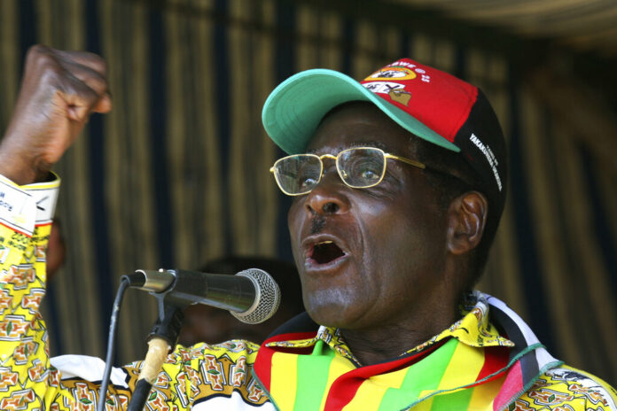 In this Tuesday, March 18, 2008 file photo, Zimbabwe President Robert Mugabe addresses party supporters at a rally in Gweru, about 250 kms. (155 miles) south of Harare. Photo: Tsvangirayi Mukwazhi / AP