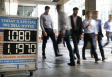 UK Currency Volatile as Investors Try to Gauge Brexit Risks Pedestrians pass a currency exchange board in London, Thursday, Aug. 29, 2019. Critics of Britain's prime minister are reacting with fury after he got Queen Elizabeth's approval to suspend Parliament. The move by Boris Johnson means his political opponents have less time to block a chaotic no-deal Brexit before the Oct. 31 withdrawal deadline. Photo: Kirsty Wigglesworth / AP