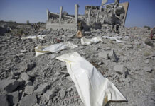 Saudi-Led Airstrikes Kill at Least 100 in Rebel-Run Prison Bodies lie on the ground after being recovered from under the rubble of a Houthi detention center destroyed by Saudi-led airstrikes, that killed at least 60 people and wounding several dozen according to officials and the rebels' health ministry, in Dhamar province, southwestern Yemen, Sunday, Sept. 1, 2019. The officials said the airstrikes took place Sunday and targeted a college in the city of Dhamar, which the Houthi rebels use as a detention center. The Saudi-led coalition said it had hit a Houthi military facility used as storages for drones and missiles in Dhamar. Photo: Hani Mohammed / AP