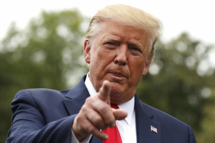 President Donald Trump speaks to members of the media on the South Lawn of the White House in Washington, Monday, Sept. 9, 2019, before boarding Marine One for a short trip to Andrews Air Force Base, Md., and then on to North Carolina. Photo: Andrew Harnik / AP