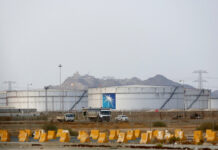 Oil Prices Surge as Attack on Saudi Facility Disrupts Output Storage tanks are seen at the North Jiddah bulk plant, an Aramco oil facility, in Jiddah, Saudi Arabia, Sunday, Sept. 15, 2019. The weekend drone attack in Buqyaq on one of the world's largest crude oil processing plants that dramatically cut into global oil supplies is the most visible sign yet of how Aramco's stability and security is directly linked to that of its owner -- the Saudi government and its ruling family. Photo: Amr Nabil / AP