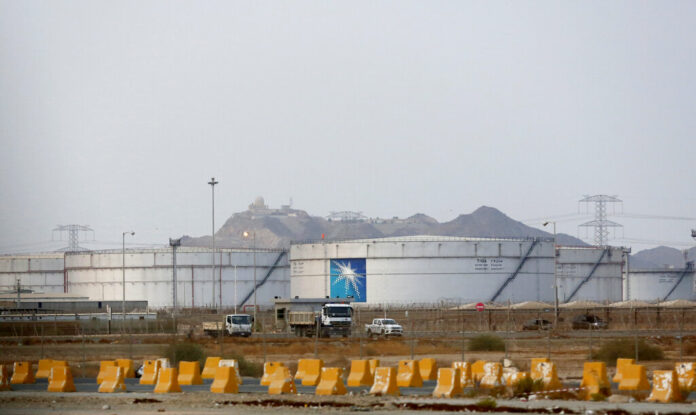 Storage tanks are seen at the North Jiddah bulk plant, an Aramco oil facility, in Jiddah, Saudi Arabia, Sunday, Sept. 15, 2019. The weekend drone attack in Buqyaq on one of the world's largest crude oil processing plants that dramatically cut into global oil supplies is the most visible sign yet of how Aramco's stability and security is directly linked to that of its owner -- the Saudi government and its ruling family. Photo: Amr Nabil / AP Storage tanks are seen at the North Jiddah bulk plant, an Aramco oil facility, in Jiddah, Saudi Arabia, Sunday, Sept. 15, 2019. The weekend drone attack in Buqyaq on one of the world's largest crude oil processing plants that dramatically cut into global oil supplies is the most visible sign yet of how Aramco's stability and security is directly linked to that of its owner -- the Saudi government and its ruling family. Photo: Amr Nabil / AP