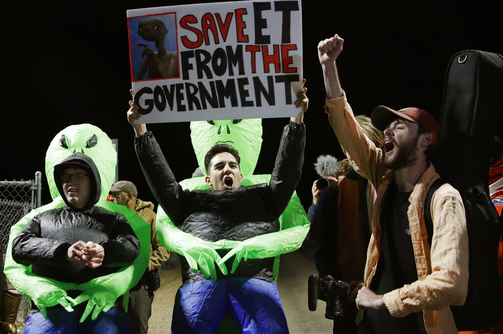 Mario Rayna, center, chants with others at an entrance to the Nevada Test and Training Range near Area 51 Friday, Sept. 20, 2019, near Rachel, Nev. People gathered at the gate inspired by the "Storm Area 51" internet hoax. Photo: John Locher / AP