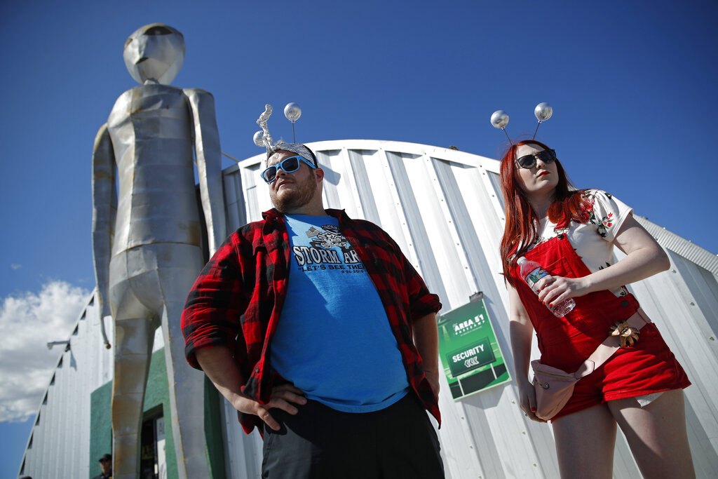 Jackson Carter and Veronica Savage wait for passes to enter the Storm Area 51 Basecamp event Friday, Sept. 20, 2019, in Hiko, Nev. The event was inspired by the "Storm Area 51" internet hoax. Photo: John Locher / AP