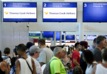 Hundreds of Thousands Affected as Thomas Cook Fails Stranded tourists line up in front of the Thomas Cook counter at the Cancun airport in Mexico, Monday, Sept. 23, 2019. British tour company Thomas Cook collapsed early Monday after failing to secure emergency funding, leaving tens of thousands of vacationers stranded abroad. Photo: Victor Ruiz / AP