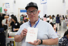 Not Just For Hipsters: Art Book Fair Back With Zines and Designs Nathan Larkin holding his latest publication “Farang Vol. 1” at Bangkok Art Book Fair on Sept. 5.