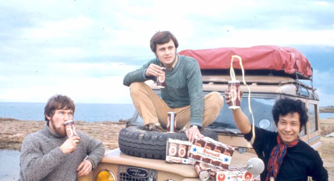 Simon Richard, George Emsden, and Anussorn Thavisin take a beer break in Italy during their 1970s overland trip from the UK to Bangkok. Photo: David Shaw / Courtesy