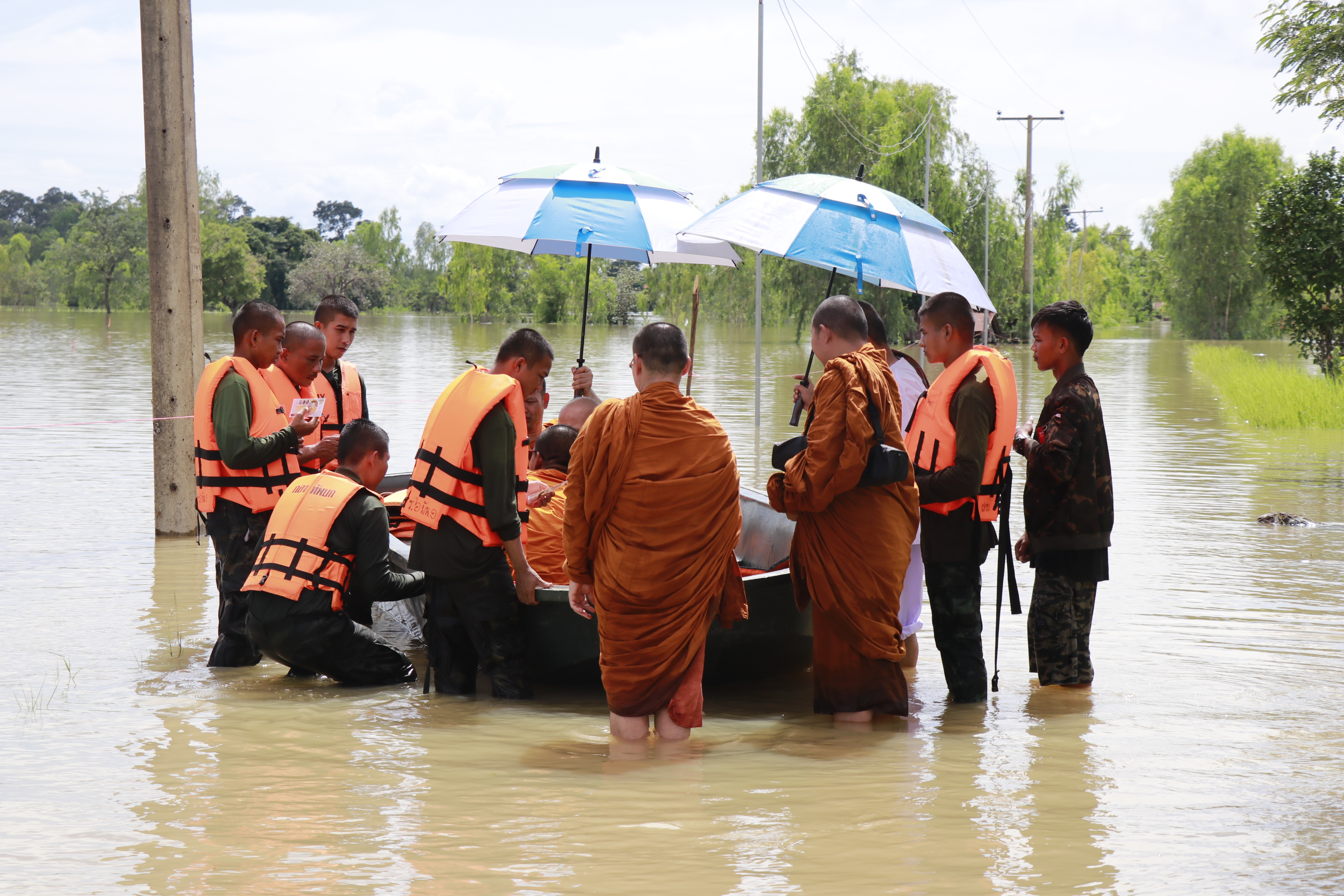 Monks being evacuated on Sept. 2 in Amnat Charoen.