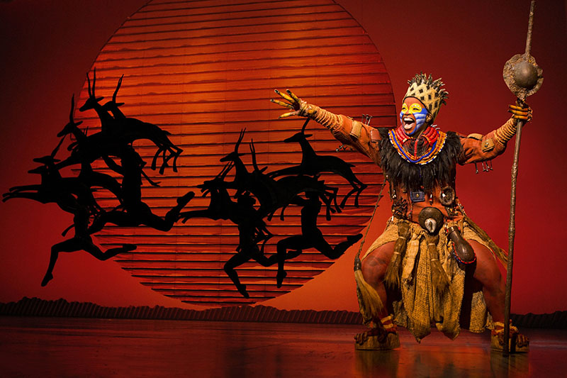 Mukelisiwe Goba as Rafiki and the North American Tour Company THE LION KING Photo by Joan Marcus
