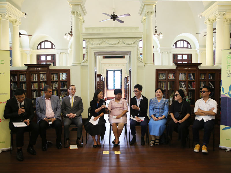 Nalin Vanasin, fourth from the left, and event partners during a press conference at Neilson Hays Library on Sept. 11.