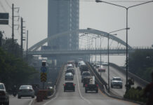 Mask On: PM2.5 Smog Returns to Bangkok Bang Phlat Intersection enshrouded in PM 2.5 smog on Sept. 30, 2019.