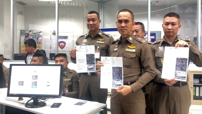 Police officers holding tickets at the Traffic Police Command Center on Aug. 30.