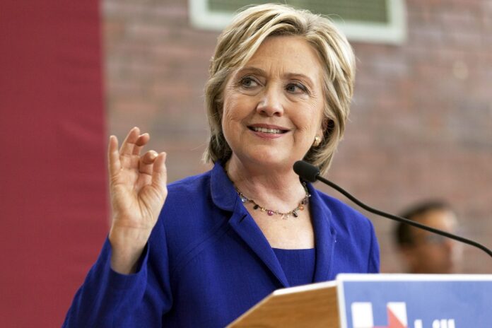 A file photo of former US presidential candidate Hilary Clinton doing the ‘OK’ hand gesture