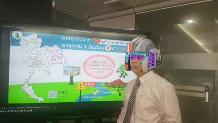 A screenshot from the Facebook live video on Sept. 2 showing Phuwieng Phrakhammintara with robotic augmented reality filter over his head. Image: the Meteorological Department / Facebook