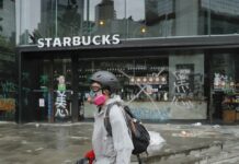 First Charges Filed in Hong Kong’s New Mask Ban