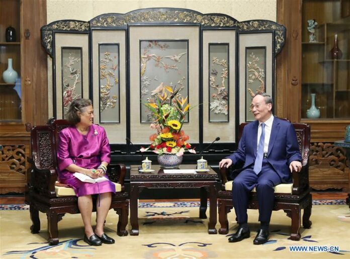 Chinese Vice President Wang Qishan (R) meets with Thai Princess Maha Chakri Sirindhorn at the Diaoyutai State Guesthouse in Beijing, capital of China, Sept. 30, 2019. (Xinhua/Liu Weibing)