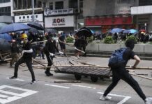 More Suspects Charged for Violating Mask Ban in Hong Kong