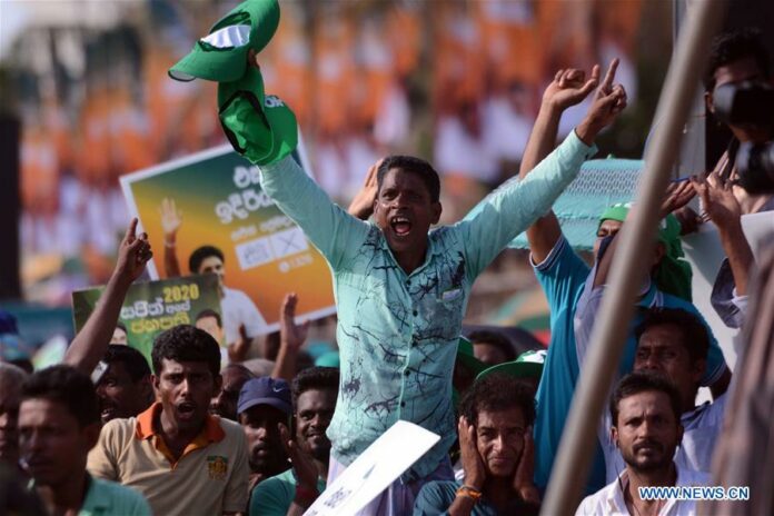 People attend an election campaign rally in Colombo, Sri Lanka, on Oct. 10, 2019. Sri Lanka's Elections Commission on Thursday said the ballot paper for the upcoming presidential elections would be 26 inches (66 cm), the longest in Sri Lankan history, due to a record number of 35 candidates running for presidency this year. Photo: Gayan Sameera / Xinhua