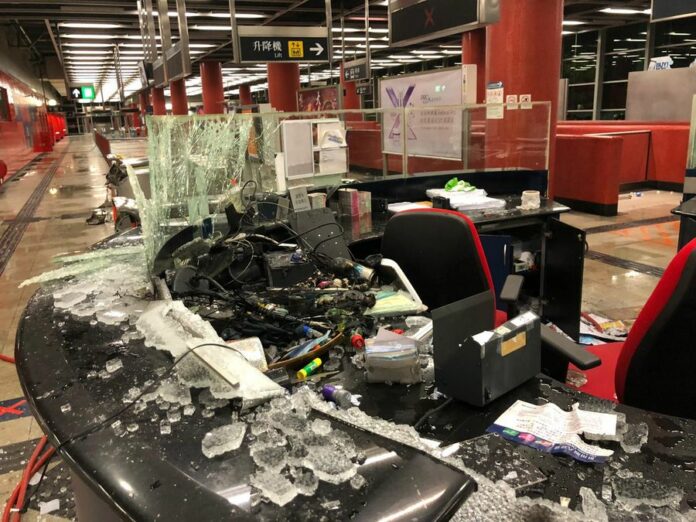 Photo shows an info counter at a MTR station smashed by rioters in Hong Kong. Photo: MTR via Xinhua