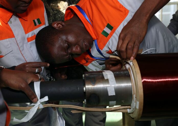 Nigerian engineers study during a training session in a factory of Huaye Group in the city of Anshan, northeast China's Liaoning Province, Oct. 14, 2019. (Xinhua/Yang Qing)