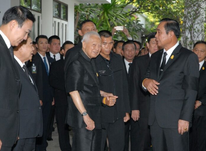 Gen. Prem Tinsulanonda greets junta chairman Prayuth Chan-ocha and his cabinet members on Aug. 24, 2017, at his home in Bangkok's Dusit district.