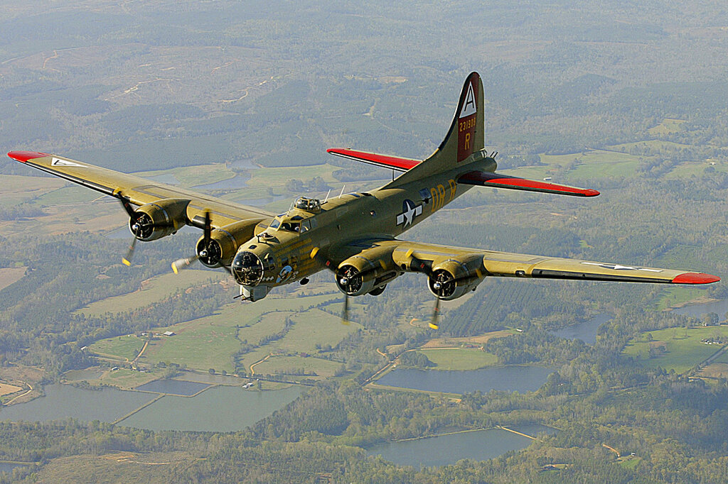 FILE - In this April 2, 2002, file photo, the Nine-O-Nine, a Collings Foundation B-17 Flying Fortress, flies over Thomasville, Ala., during its journey from Decatur, Ala., to Mobile, Ala. A B-17 vintage World War II-era bomber plane crashed Wednesday, Oct. 2, 2019, just outside New England's second-busiest airport, and a fire-and-rescue operation was underway, official said. Airport officials said the plane was associated with the Collings Foundation, an educational group that brought its "Wings of Freedom" vintage aircraft display to Bradley International Airport this week. Photo: John David Mercer/Press-Register via AP File