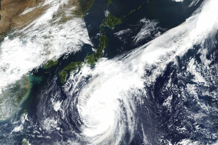 This Oct. 10, 2019, satellite photo taken by NASA-NOAA's Suomi NPP satellite shows typhoon Hagibis approaching Japan, center left. Japan’s weather agency is warning a powerful typhoon may bring torrential rains to central Japan over the weekend. Photo: NASA Worldview, Earth Observing System Data and Information System (EOSDIS) via AP