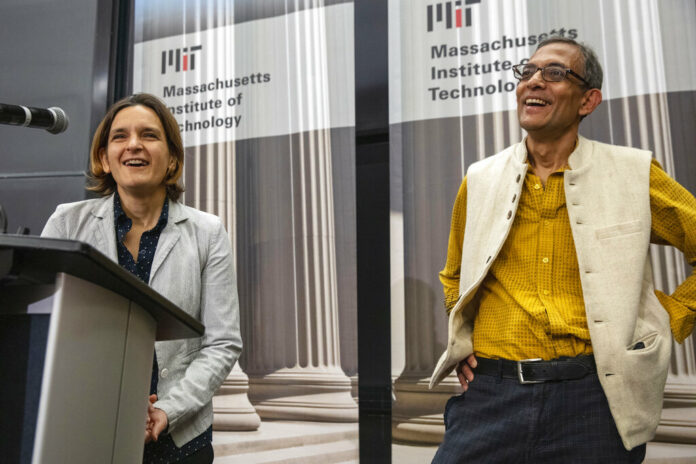 Esther Duflo, left, and Abhijit Banerjee speak during a news conference at Massachusetts Institute of Technology in Cambridge, Mass., Monday, Oct. 14, 2019. Banerjee and Duflo, along with Harvard's Michael Kremer, were awarded the 2019 Nobel Prize in economics for pioneering new ways to alleviate global poverty. Photo: Michael Dwyer / AP