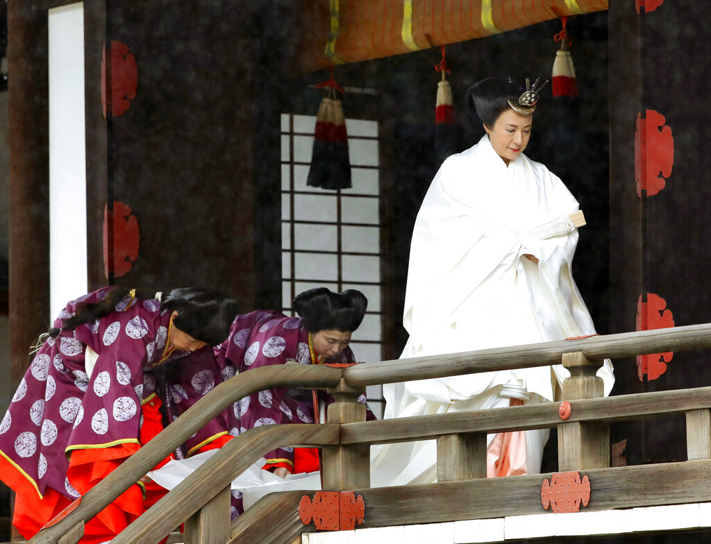 Japan's Empress Masako leaves after praying at “Kashikodokoro”, one of three shrines at the Imperial Palace, in Tokyo, Tuesday, Oct. 22, 2019.  Emperor Naruhito and Empress Masako visited three Shinto shrines at the Imperial Palace before Naruhito proclaims himself Japan’s 126th emperor in an enthronement ceremony. Photo: Kyodo News via AP
