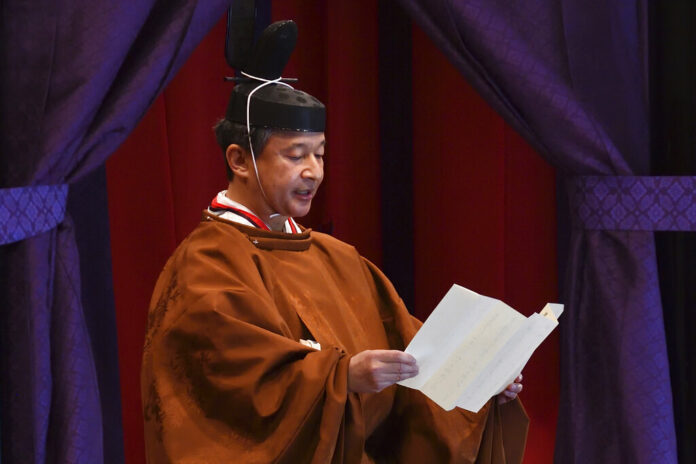 Emperor Naruhito delivers his speech during the enthronement ceremony where he officially proclaims his ascension to the Chrysanthemum Throne at the Imperial Palace in Tokyo on Tuesday, Oct. 22, 2019. Photo: Kazuhiro Nogi / Pool Photo via AP