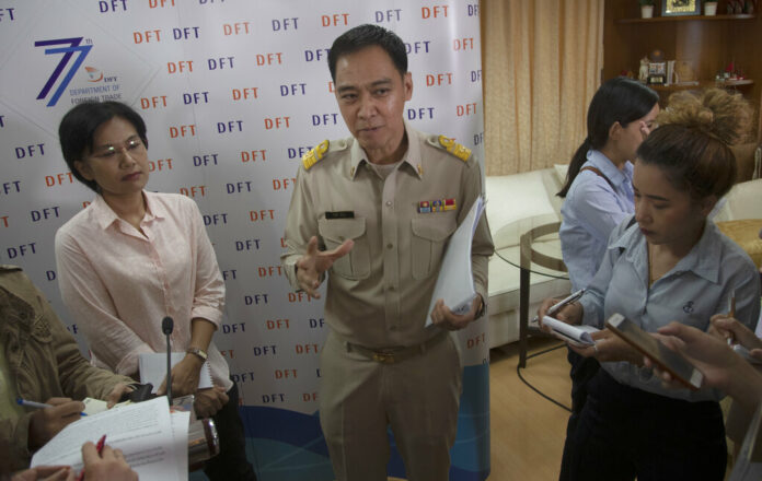 Senior Thai Commerce Ministry Keerati Rushchano talks to the media after a press conference at the Department of Foreign Trade, Ministry of Commerce, in Nonthaburi province. Monday, Oct. 28, 2019. Thai officials have said that plans by the United States to end preferential trade privileges on a range of imports from Thailand were not unexpected, and would seek talks with Washington on the matter. Photo: Sakchai Lalit / AP