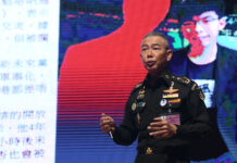 Apirat Revives Red Scare in Epic Rant Against Opposition Army chief Gen. Apirat Kongsompong speaks at a "lecture" on Oct. 11, 2019.