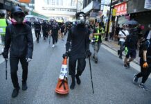 Day of Rage: Hong Kong Protesters Throw Acid at Cops, Smash up Shops