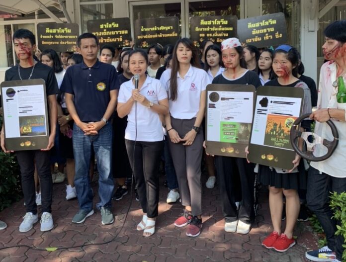 Activists, some dressed up as ghosts of drunk drivers, urge police to crack down on Halloween night alcohol law violations in Bangkok on Oct. 30, 2019.