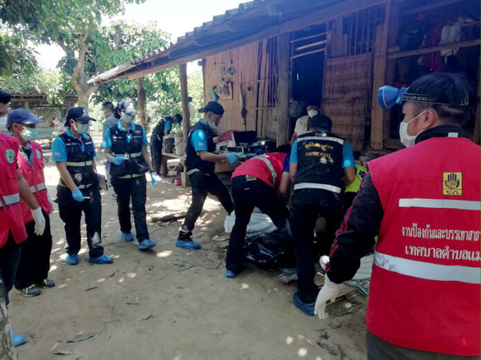 Police at the hut where three workers were stabbed to death on Oct. 22, 2019.