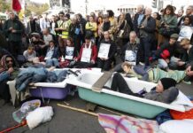London Commuters Scuffle With Climate Activists