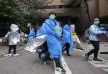 Last Holdouts Surrounded by Police at Hong Kong University