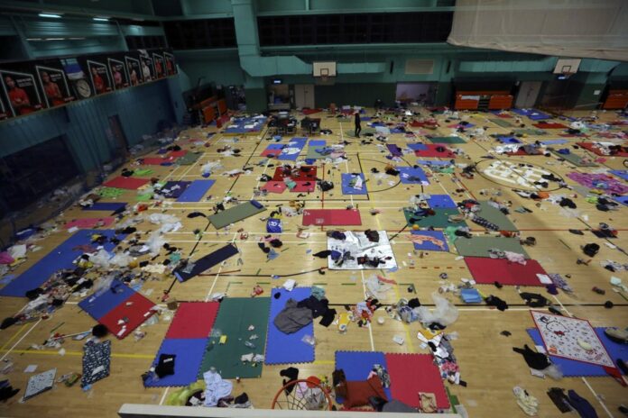 Belonging of protesters are left in the campus of the Polytechnic University in Hong Kong, Wednesday, Nov. 20, 2019. (AP Photo/Ahmad Ibrahim)