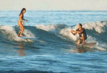 Hawaii Man Proposes to Girlfriend While Surfing