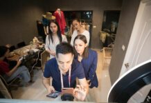 China’s 11.11 Shopping Spree Sees Robust Sales Nunthapong Boonnao (Front) and Manassawee Suangkaew (1st, R) go on live-streaming to promote their online clothing shop registered in Lazada, a major online shopping company in Southeast Asia, at Bangkok, Thailand, Oct. 21, 2019. Photo: Zhang Keren / Xinhua